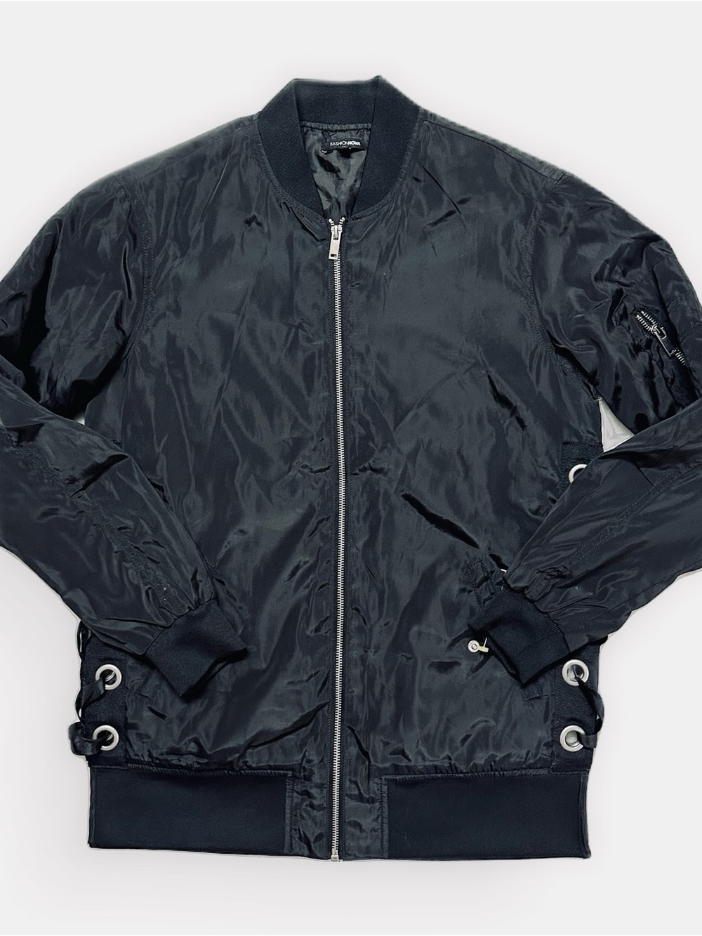 Fashion Nova Black Bomber Jacket with Grommet Detail. 80% good.